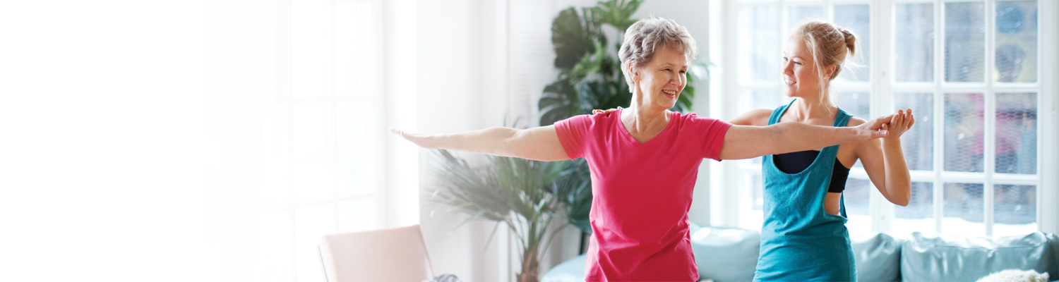 Women doing in home exercise 