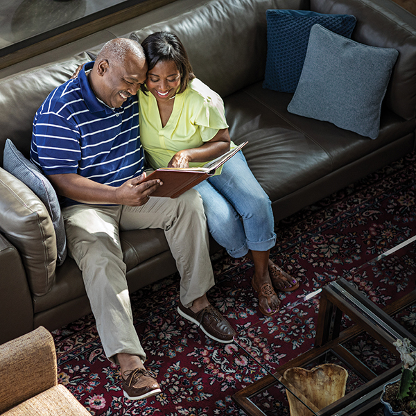 Couple reading on a couch Couple reading on a couch
