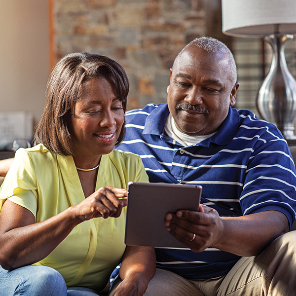 Couple looking at tablet